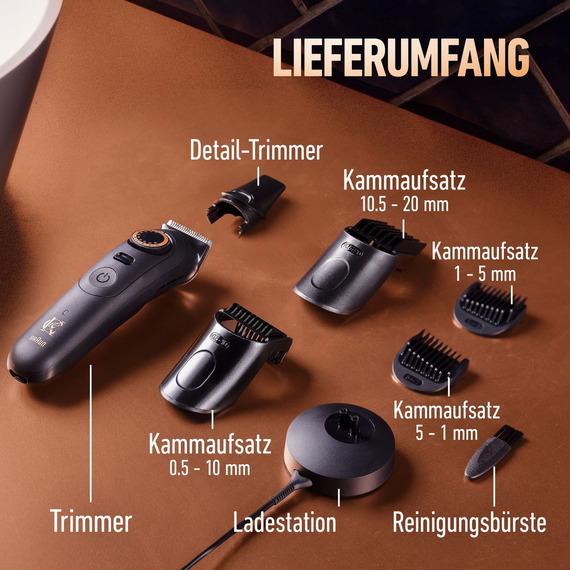 Die Trimmer Pro Max Box mit Ladestation, ReinigungsbÃ¼rste, Detail-Trimmer und 4 KÃ¤mme auf einer kupferfarbenen BadoberflÃ¤che